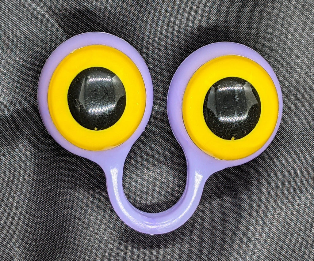Lavender pair of Peepers Puppets with Yellow Eyes.