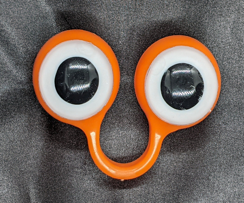 Orange pair of Peepers Puppets with White Eyes.