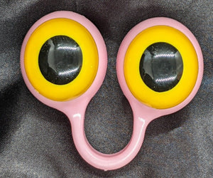 Pastel Pink pair of Peepers Puppets with Yellow Eyes.
