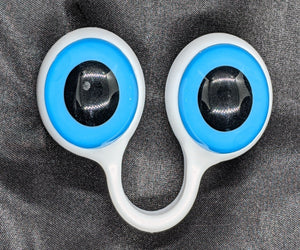 White pair of Peepers Puppets with Blue Eyes.